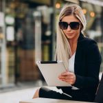 jpeg-optimizer_business-woman-sitting-bench-working-tablet
